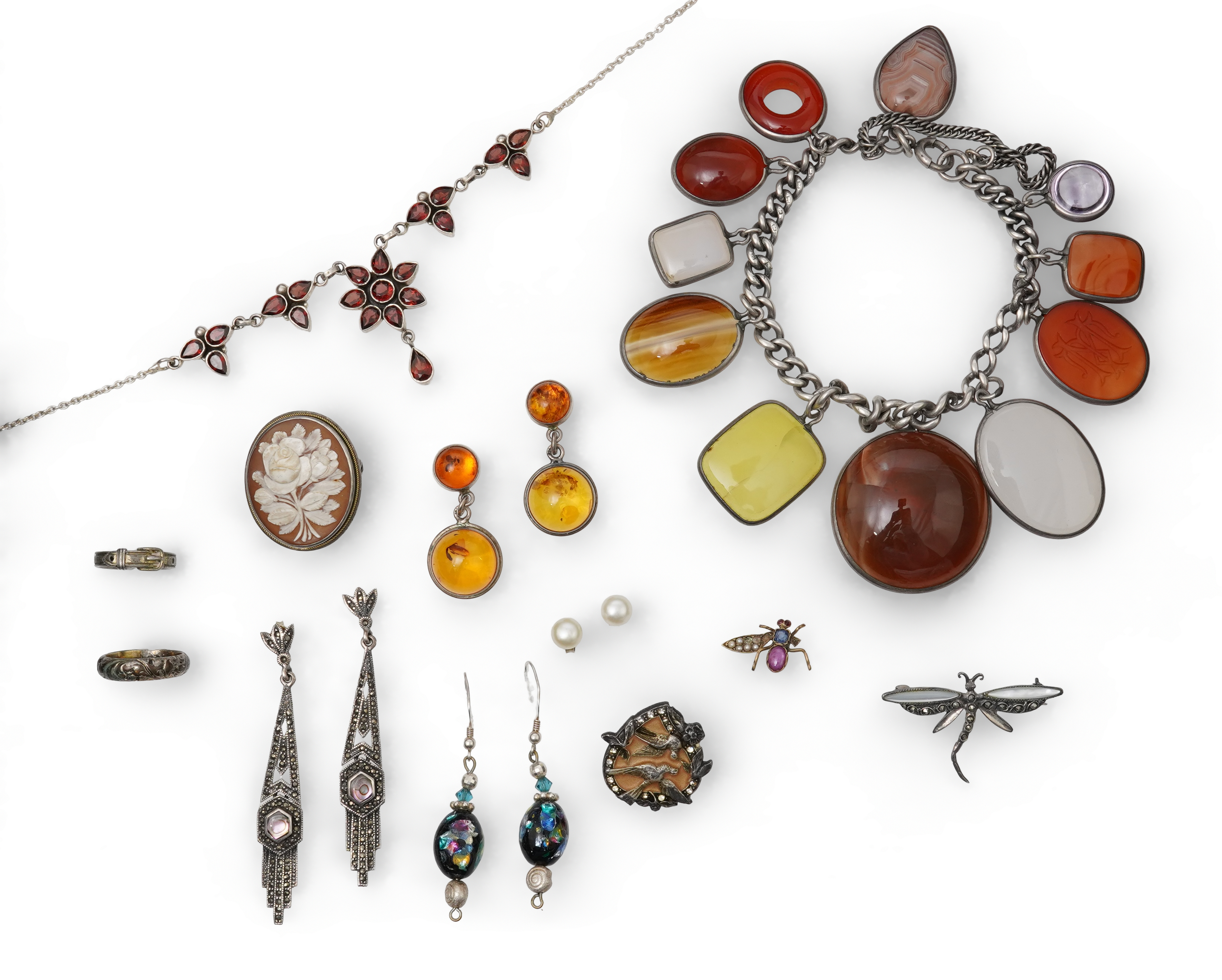A small collection of costume jewellery to include a silver curb link charm bracelet, hung with assorted bezel set agate and carnelian drops, together with other silver and costume jewellery